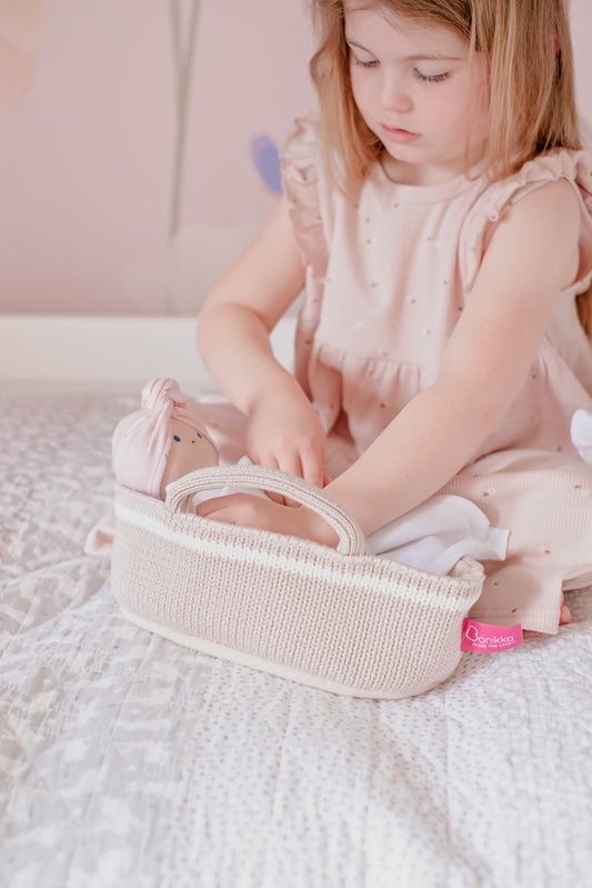 Baby Remi Doll with Green Outfit and Knitted Carry Cot